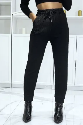 Pantalon noir à taille haute et motif relief 