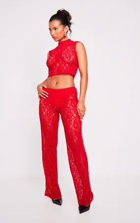 Pantalon rouge sang à taille haute et dentelle transparente coupe évasée