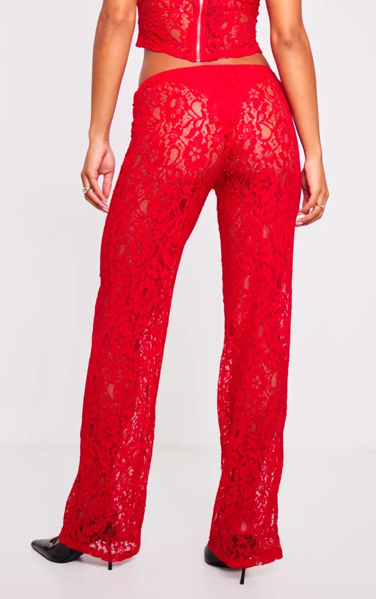 Pantalon rouge sang à taille haute et dentelle transparente coupe évasée