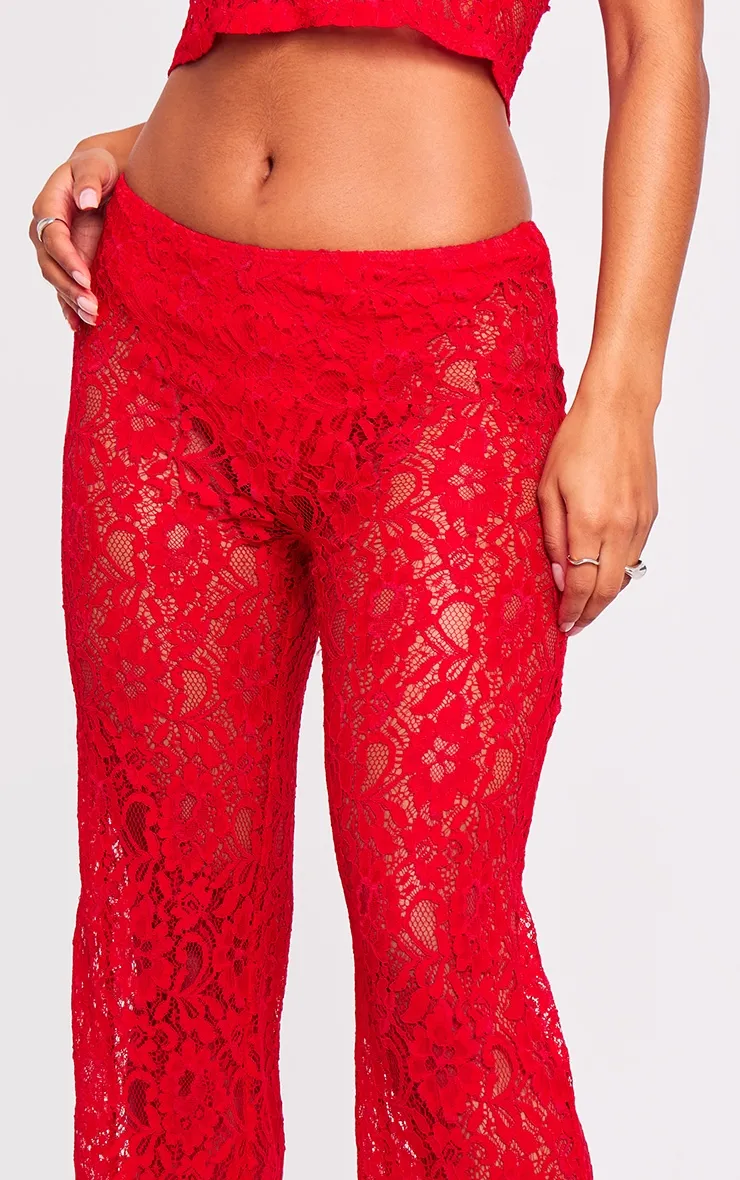 Pantalon rouge sang à taille haute et dentelle transparente coupe évasée